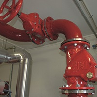 Installation of swing check valve in indoor fire protection